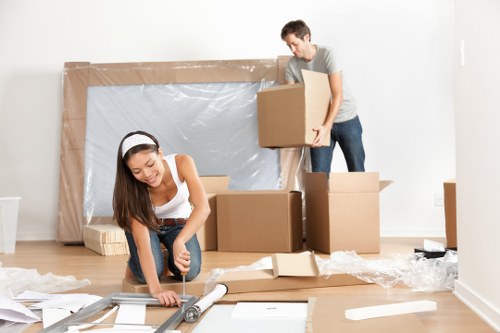 Moving van loading boxes and furniture in Finsbury Park