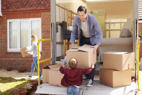 Local home moving service in Finsbury Park with packed boxes and moving van