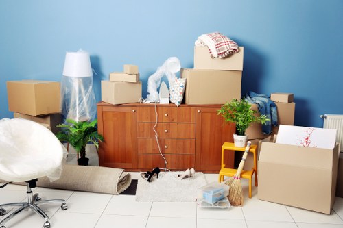 House removal team planning a move in Finsbury Park street setting