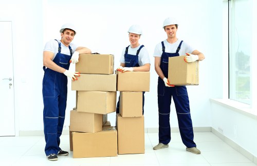 Local removals vehicle loading office furniture near Finsbury Park