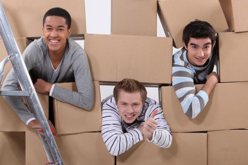 Packing boxes and household items for a local van move in North London