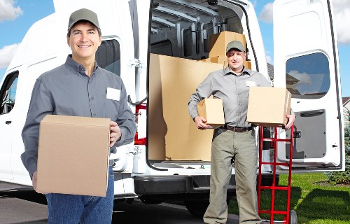 Careful loading of furniture and boxes during a North London flat removal