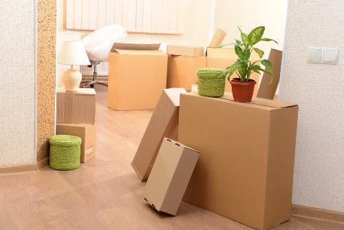 Boxes and household items prepared for transport by a local removals team