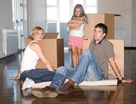Packed moving boxes ready for collection from a local apartment